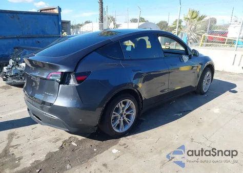 2023 Tesla Model Y Awd/Long Range Dual Motor All-Wheel Drive z USA, uszkodzony, nr VIN 7SAYGDEE3PF865229